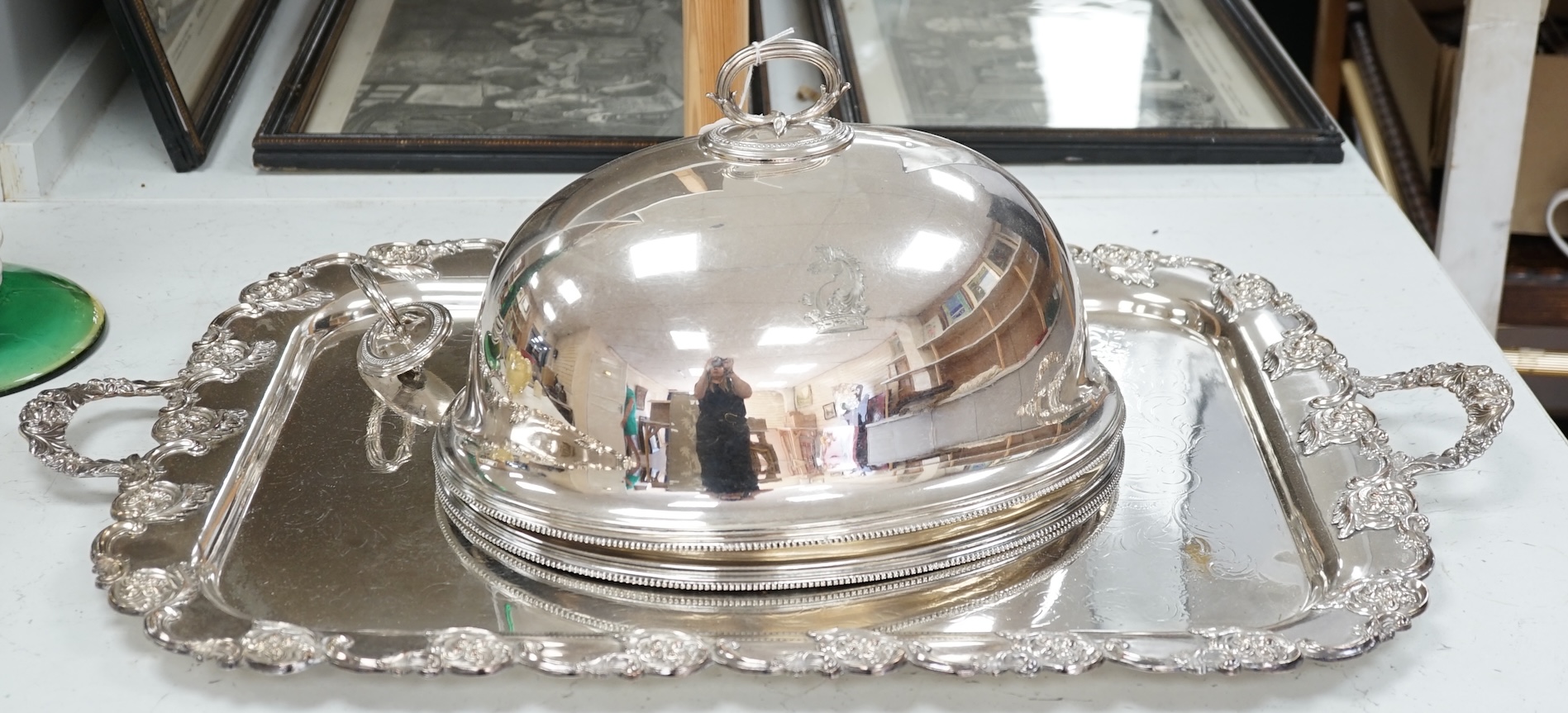 A pair of Victorian electroplate meat domes and a large two handled tray, tray 76cm wide including handles. Condition - good